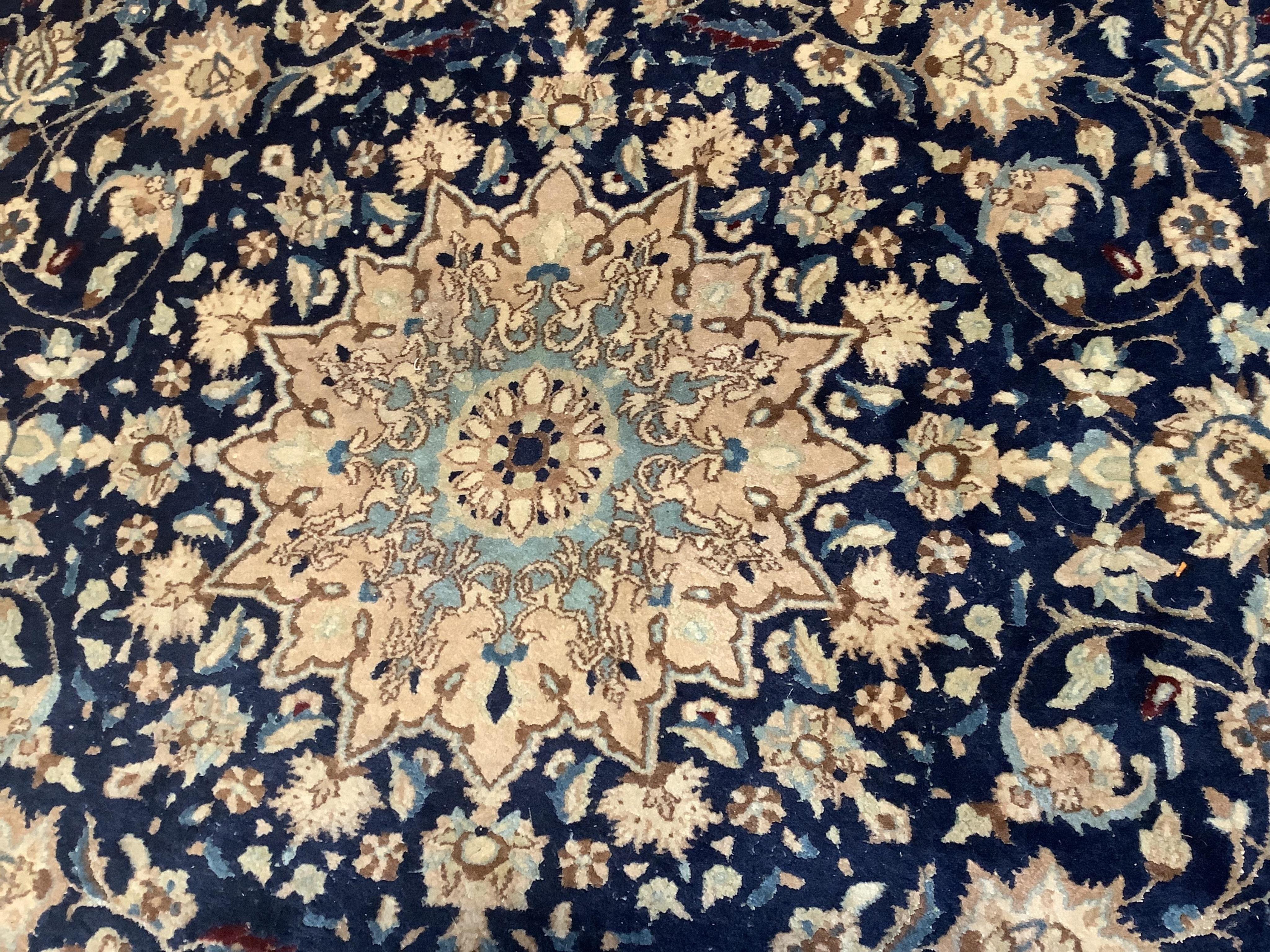 A Nain blue ground carpet, 277 x 174cm. Condition - fair to good